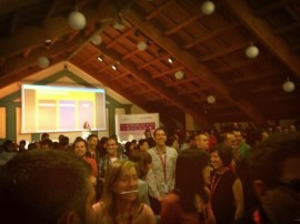 Eva proposed conference participants to place a pen on their mouth, to force a smile and feel good